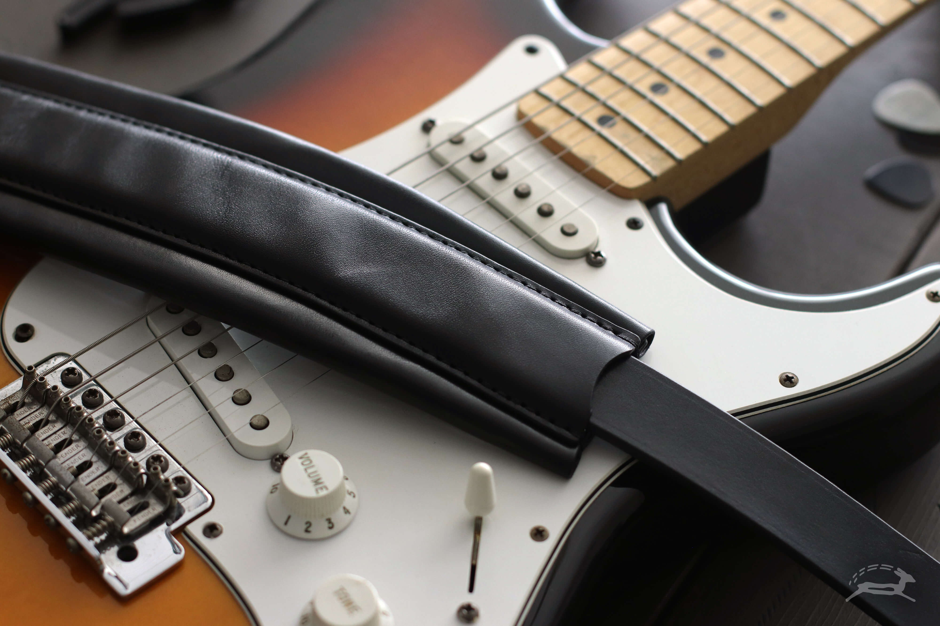 Black leather guitar strap with sunburst strap - OCHRE handcrafted