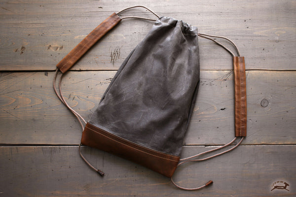 The FLATPACK Waxed Canvas Backpacks OCHRE handcrafted FLINT