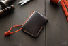 Dark brown leather wallet with safety orange accents - OCHRE handcrafted