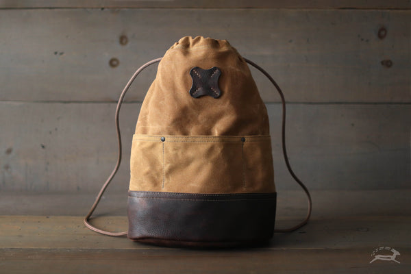 backpack bag canadian canvas leather 25L Traveler Tan Our Classic Backpack in Forest Green Canvas and Vintage Brown Leather can comfortably accommodate an A4 pad and a 13 laptop Handmade Leather Bags | Made
