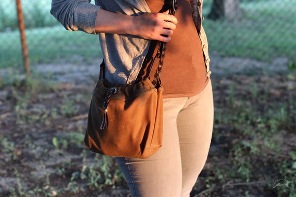 leather and canvas cross-body bag outdoors - OCHRE handcrafted