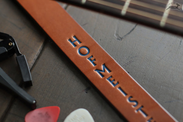 blue embossed leather guitar strap